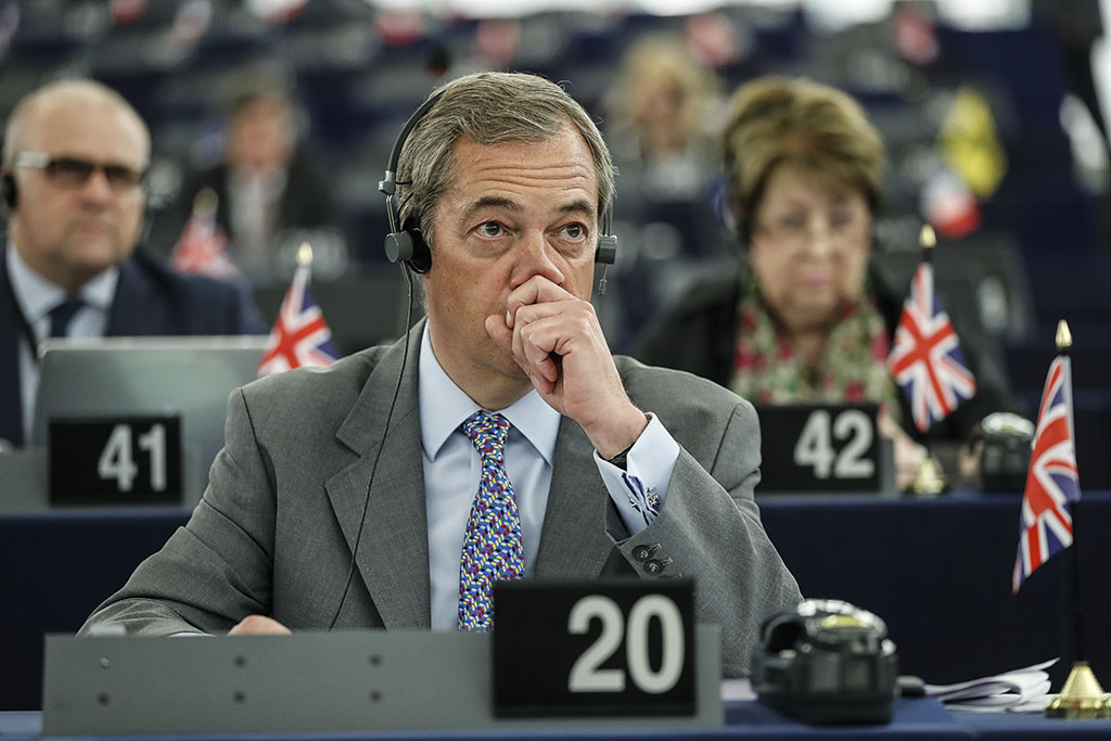 <p>The former leader of the UK Independence Party, Nigel Farage, listens during a European Parliament session in Strasbourg, France, last month. (AP Photo/Jean-Francois Badias)</p>