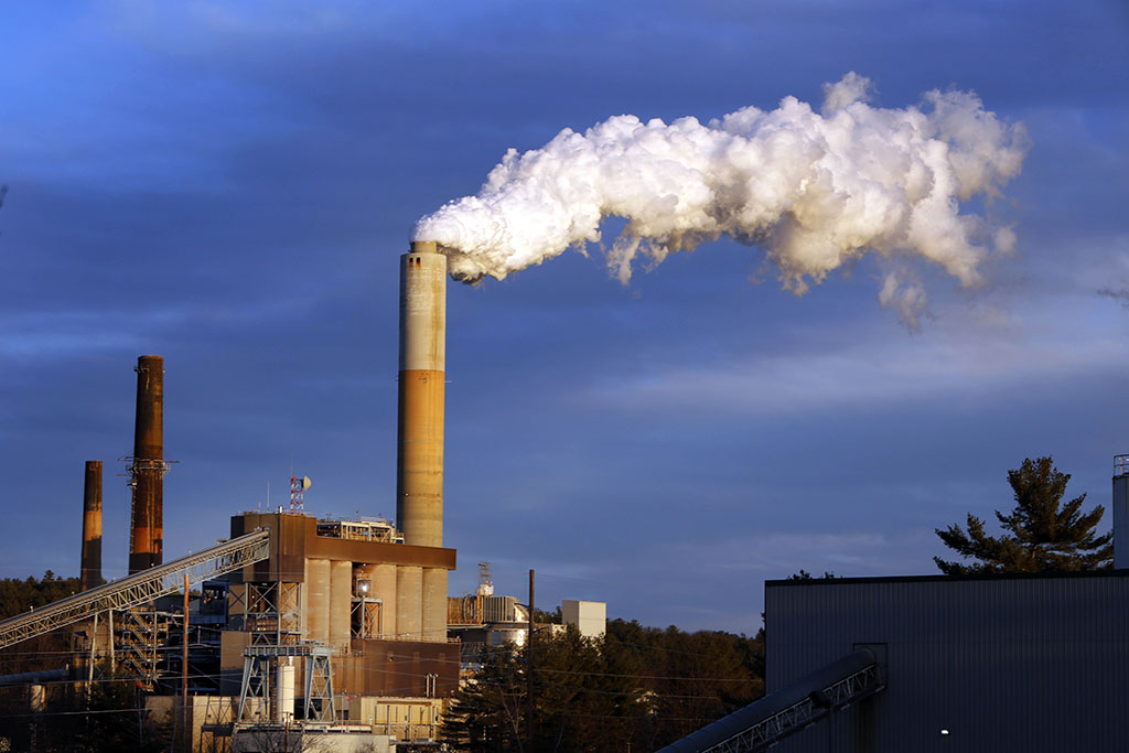 <p>In this Jan. 20, 2015 file photo, a plume of steam billows from the coal-fired Merrimack Station in Bow, New Hampshire. President Donald Trump may abandon U.S. pledges to reduce carbon emissions, but global economic realities ensure he is unlikely to reverse the accelerating push to adopt cleaner forms of energy. (AP Photo/Jim Cole, File)</p>