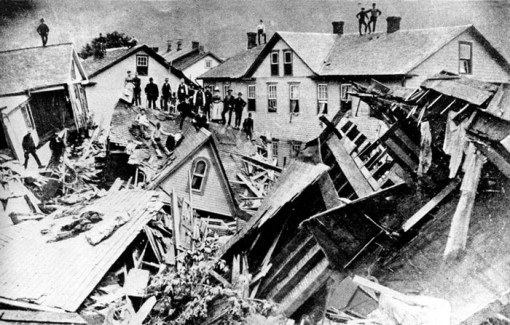 Citizens stand atop the ruins of houses destroyed in the 1889 file photo showing the aftermath of the Johnstown, Pennsylvania  flood. The historic disasters 125th anniversary is May 31, 2014. 