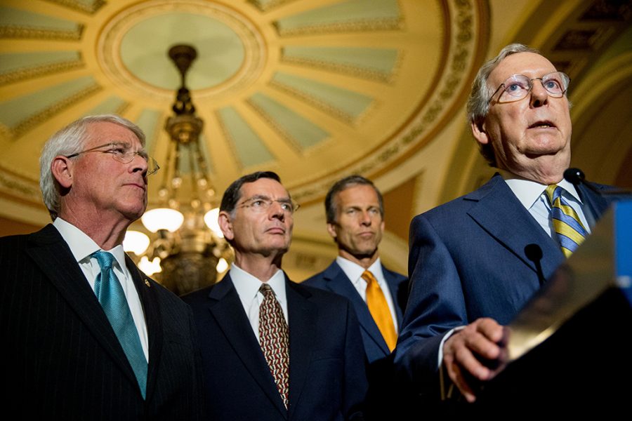 Senate Majority Leader Mitch McConnell of Ky., right, accompanied by, from left, Sen. Roger Wicker, R-Miss., Sen. John Barrasso, R-Wyo. and Sen. John Thune, R-S.D., speaks to the media during a news conference on Capitol Hill in Washington, Tuesday, June 2, 2015, following a Senate policy luncheon as legislation to end the National Security Agencys collection of Americans calling records while preserving other surveillance authorities is expected to clear the Senate late Tuesday. But House leaders have warned their Senate counterparts not to proceed with planned changes to a House version. (AP Photo/Andrew Harnik)