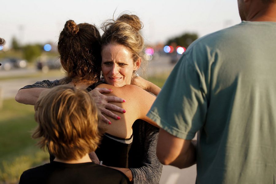 Women hug after shooting in Oklahoma City