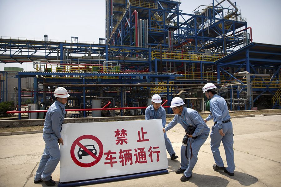 workers near a plastic factory in China