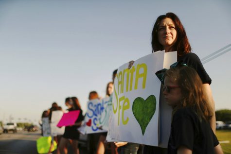 Andi Lewis, director of the Kingwood High School Fillies dance team, brought team members to Santa Fe in support of Santa Fe High School students