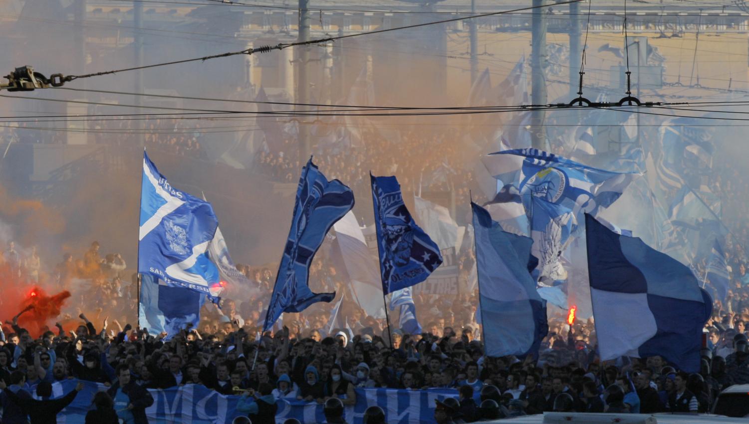 Zenit's fans march prior to their national soccer Championship in downtown St.Petersburg, Russia. Racist and anti-gay chants have become more common in Russian soccer as the country prepares to host the World Cup, even as overall incidents of discrimination declined.