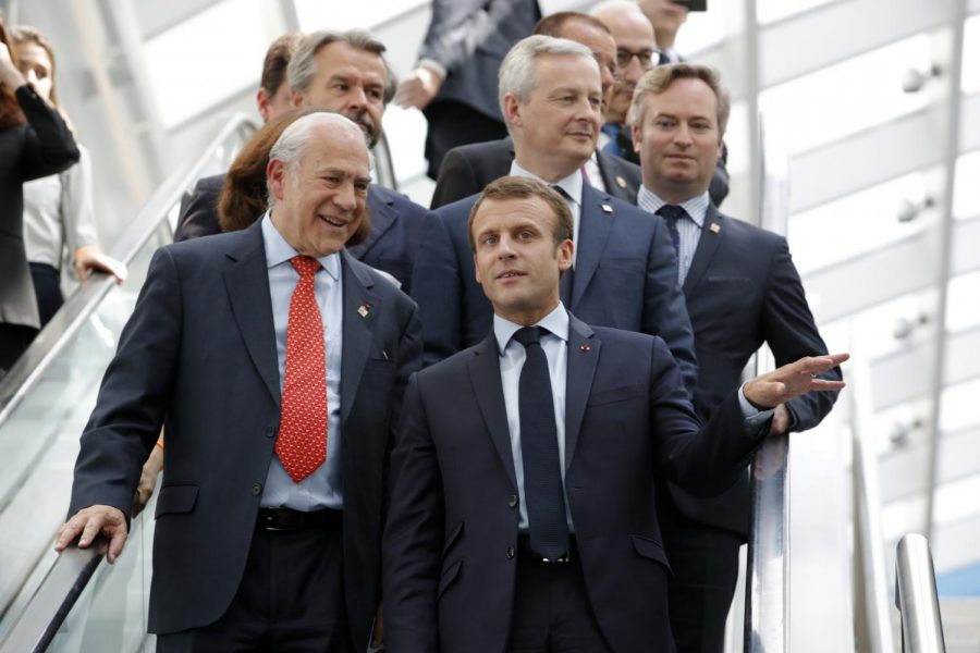 Macron on an escalator