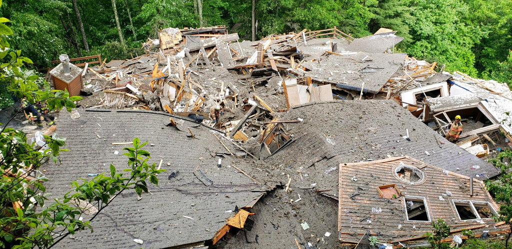 This photo provided by the Boone Police Department shows a home was destroyed by a gas leak following a landslide from the effects of Subtropical Storm Alberto on May 30, 2018 in Boone, N.C. Sgt. Shane Robbins said the landslide resulted in the