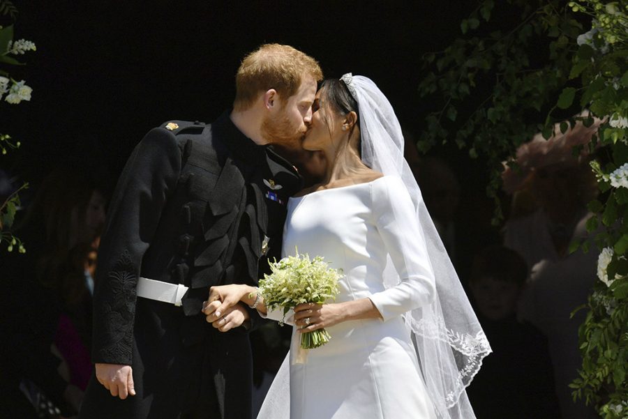 Prince Harry and Meghan Markle kiss