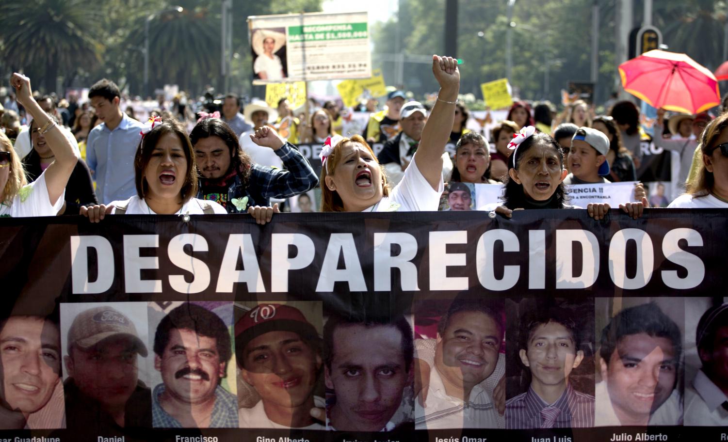 In this May 10 photo, women call attention to people who have gone missing in the fight against drug cartels and organized crime, demanding authorities locate their loved ones, as they mark Mother's Day in Mexico City. According to federal data, there have been more than 6,000 registered disappearances in Mexico's Tamaulipas state since 2006, more than any other state.