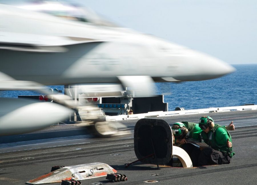 An F/A-18 fighter jet takes off from the deck of the USS Abraham Lincoln aircraft carrier in the Arabian Sea on Monday, June 3, 2019. The U.S. aircraft carrier the White House ordered to the Mideast over a perceived threat from Iran remains outside of the Persian Gulf amid efforts to de-escalate tensions between Tehran and Washington. (AP Photo/Jon Gambrell)