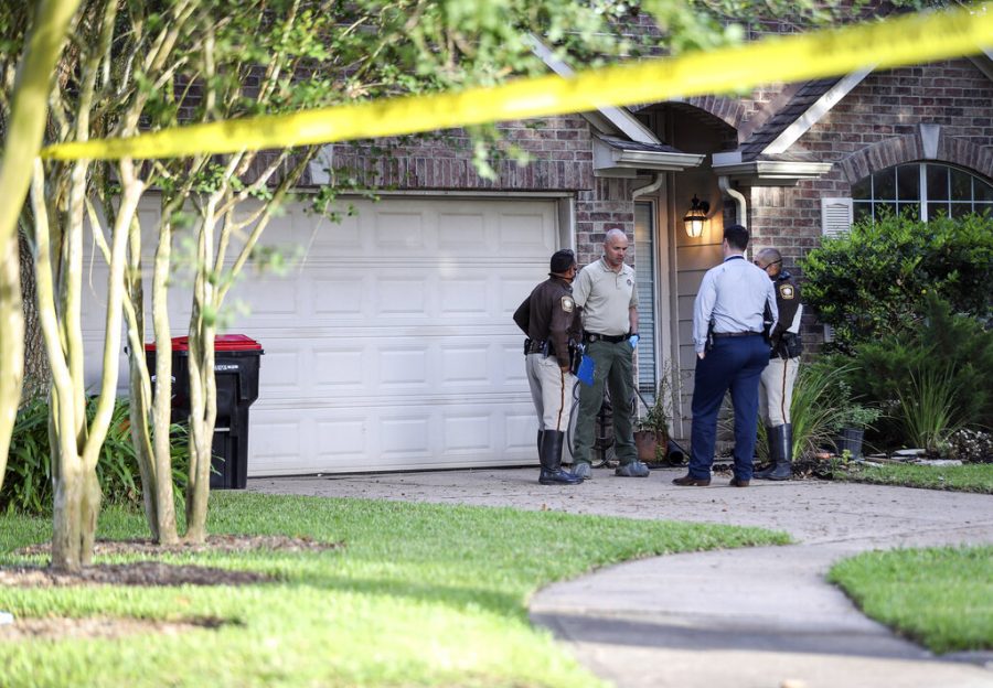 Authorities investigate the scene where a Fort Bend County Deputy Sheriff fatally shot a Fort Bend County Precinct 4 Deputy Constable after mistaking him for an intruder as they cleared a house May 29, 2020, in Missouri City, Texas. 