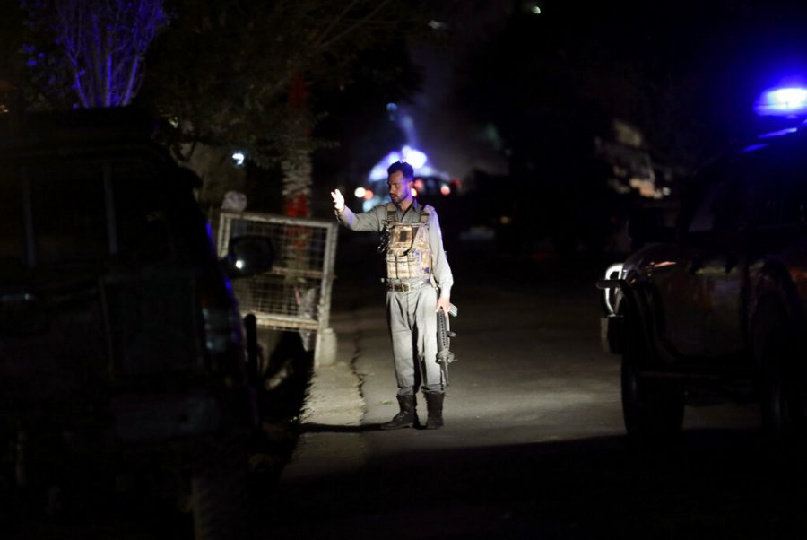 An Afghan security personnel arrives at the site of an explosion June 1.