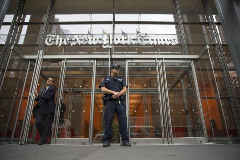 Police officer outside of New York Times building