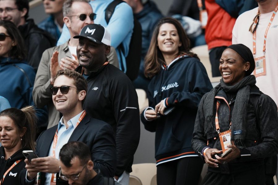 Corey, left with cap, and Candi Gauff, right, parents of Coco Gauff of the U.S., watch her fourth round match against Belgiums Elise Mertens at the French Open tennis tournament in Roland Garros stadium in Paris, France on May 29, 2022.