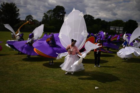 Members of the Mahogany carnival group take part in a rehearsal for their upcoming performance at the Platinum Jubilee Pageant, at Queens Park Community School.