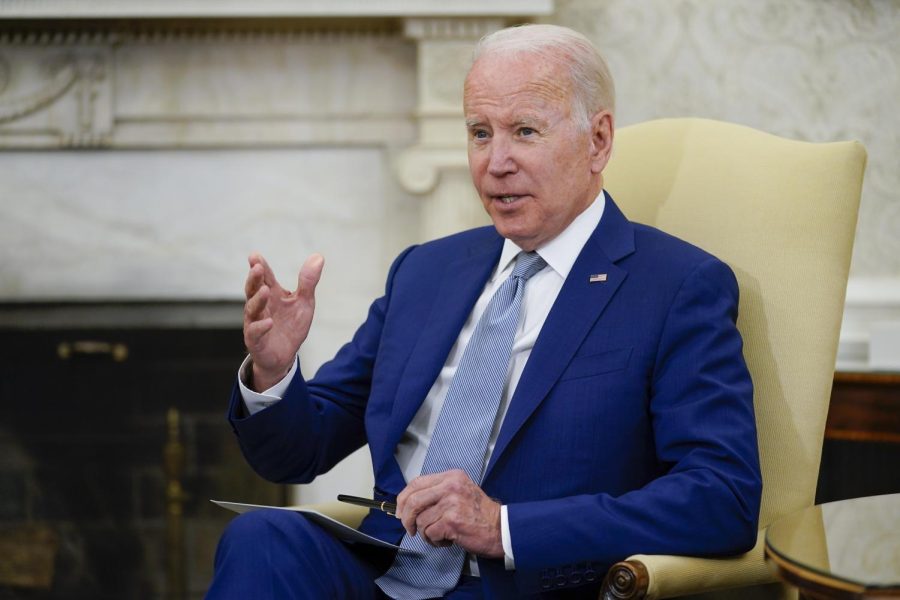 President Joe Biden speaks in the Oval Office of the White House on Tuesday in Washington. The Biden administration announced it will send Ukraine a small number of high-tech, medium range rocket systems, a critical weapon that Ukrainian leaders have been begging for as they struggle to stall Russian progress in the Donbas. 