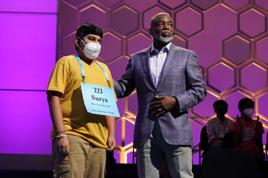 Actor LeVar Burton stands with Surya Kapu, 13, from South Jordan, Utah, during the Scripps National Spelling Bee, Thursday in Oxon Hill, Md. Surya Kapu received a second chance after appealing his elimination in the semifinal round.
