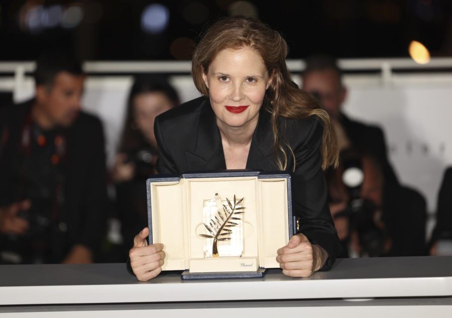 Justine Triet, winner of the Palme dOr for Anatomy of a Fall, poses for photographers during a photo call following the awards ceremony at the 76th international film festival, Cannes, southern France, Saturday.