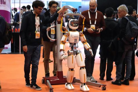 A robot from the Italian IIT interacts with visitors during the International Conference on Robotics and Automation in London on May 30, 2023. The 2023 ICRA brings together the worlds top academics, researchers and industry representatives to showcase new developments in their industry. 