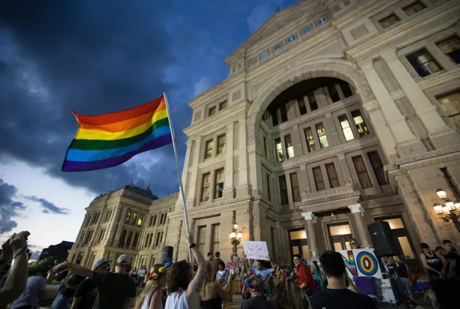 LGBTQ+ Texans gather at the Capitol to commemorate the Stonewall riots.